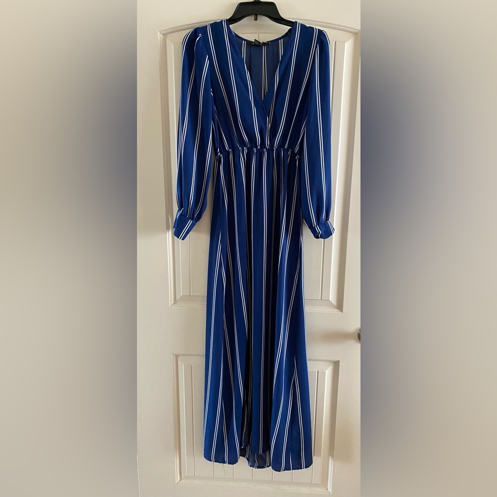 Blue maxi dress with white stripes. Long sleeve. High slit